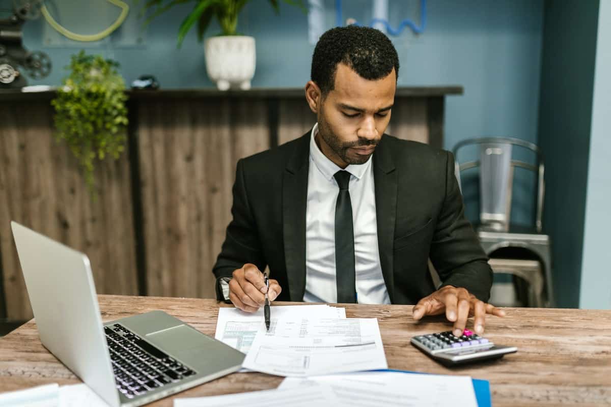 man reading financial records